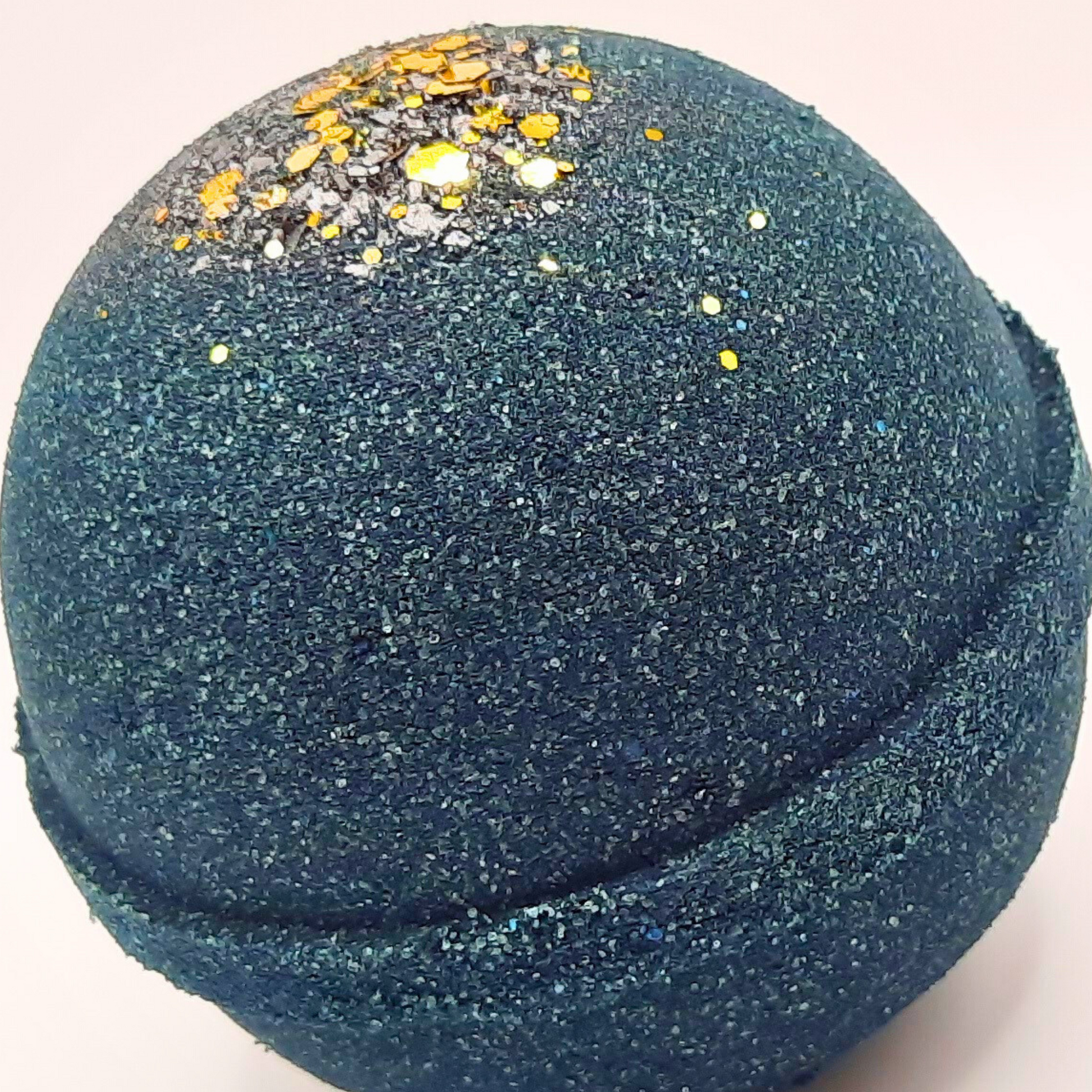 Nightfall Hemp oil bath bomb, dark green/black in color with gold biodegradable glitter