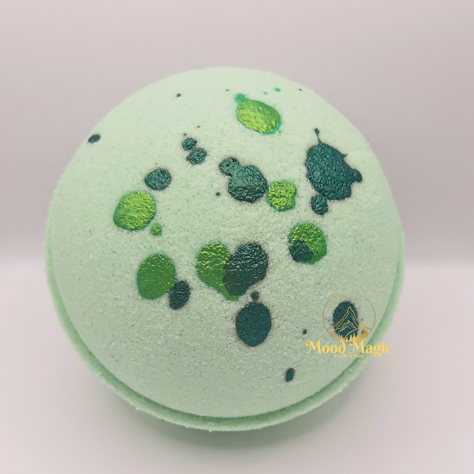 Eucalyptus Forest Hemp Oil Bath Bomb, pastel green bath bomb with moss green and gold green mica droplets. 